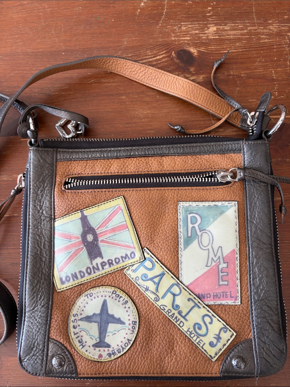 Brighton Brown and Dark Gray Leather Patch Crossbody Bag. Expandable side zip.